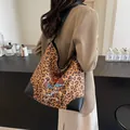Leopard print tote bag with cartoon dachshund dogs and black leather trim - Brown