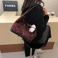 Contrast leopard print tote bag for women with red and black plush fabric and charms - Burgundy