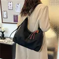 Classic black suede large tote bag with decorative braided rope zipper pull on shoulder - Regular Fit / Black