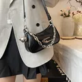 Fashionable black hobo bag with vintage crinkled leather and silver star buckle - Black