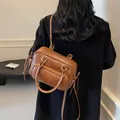 Retro brown faux leather backpack for women with adjustable strap and tassel detail - 27*12*17 / Brown