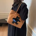 Brown suede tote bag with cartoon plush cat decoration and blue fish detail - Brown