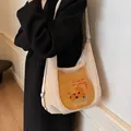 Beige Cord-Einkaufstasche mit süßem gelben Katzen-Patch und verstellbarem Riemen - Gebrochenes Weiß