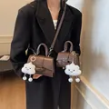 Brown vintage faux leather shoulder bag with plush cloud charm and slim strap - Large / Brown