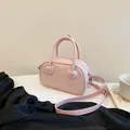 Mini borsa Boston rosa in ecopelle trapuntata con dettaglio cuore e tracolla rimovibile - Rosa