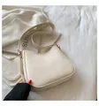 Vintage cream white leather shoulder bag with gold adjustable buckle and smooth finish - White