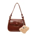 Retro brown PU leather shoulder bag with circular buckle and star plush charm - Brown
