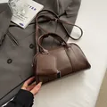 Brown leather crossbody bag with matching zipper pouch and adjustable shoulder strap - 24*8*13cm / Coffee