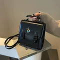 Chic black school-style handbag with dog embroidery and glossy PU leather finish - 20x8x20cm / Black