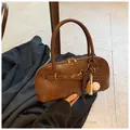 Vintage dark brown shell bag with baseball charm and gold hardware for women - With Pendant / Dark Brown