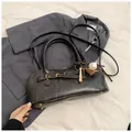 Retro charcoal grey shell handbag with baseball charm and gold hardware accents - With Pendant / Black