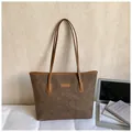 Deep brown tote bag with embossed cartoon motifs and slender shoulder straps - Coffee without Pendant