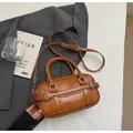 Retro brown leather baguette handbag with silver buckles and adjustable shoulder strap - Basic Style / Orange