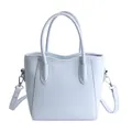 Borsa a secchiello azzurra in ecopelle con trama litchi e tracolla rimovibile - Senza Ciondolo / Blu