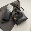 Chic black faux leather bucket bag set with chain detail and matching inner clutch - Black (With Pouch)