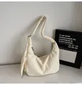 Ivory white padded nylon crescent tote bag with adjustable strap and silver zipper - No Pendant / Off White