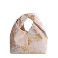 Elegant champagne knot bag featuring orange floral jacquard and a single handle - 22x10x15cm / Yellow