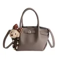 Brown lychee leather bucket bag with silver lock and plush puppy charm accessory - Gray (With Charm)