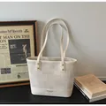 Chic cream canvas and leather patchwork tote bag with long handles and vintage style - Off White