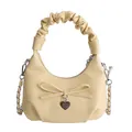 Creamy yellow pleated dumpling bag with bow detail and metallic chain strap - Yellow