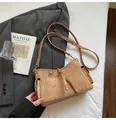 Brown suede baguette bag with bow drawstring and contrast stitching details - No Pendant / Beige