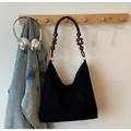 Black frosted hobo tote bag featuring a unique dark wooden bead shoulder strap detail - Regular Fit / Black