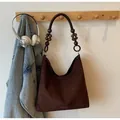 Dark brown large capacity hobo bag featuring vintage wooden bead and metal ring strap - Regular Fit / Brown