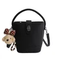 Black litchi grain bucket bag with silver twist lock and teddy bear charm accessory - Black With Pendant