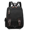Classic black canvas men's business backpack with vintage leather accents and large capacity - Black