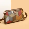Borsa a tracolla bohemian in pelle martellata multicolore con logo floreale dorato - Patchwork Grigio e Marrone