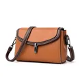 Brown contrast leather saddle bag with lychee pattern and metallic buckle closure - Yellow