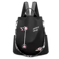 Mochila antirrobo para mujer en oxford negro con bordado floral y logotipo - Negro