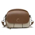Chic two-tone saddle bag in brown and cream with contrast stitching and silver hardware - Coffee