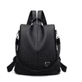 Sac à dos noir en cuir pour femme avec texture tressée et logo métallique - Noir