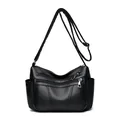 Bolso bandolera negro de cuero granulado con múltiples bolsillos y correa ajustable - Negro