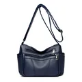 Bolso bandolera azul oscuro de piel suave con múltiples cremalleras y gran capacidad - Azul