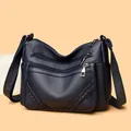 Bolso bandolera de cuero azul marino con múltiples bolsillos y correa ajustable - Azul marino