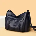 Fashionable dark blue crossbody bag with lychee pattern leather and woven detail - Dark Blue