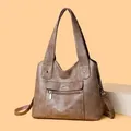 Brown soft leather tote bag for women featuring double handles and adjustable strap - Camel