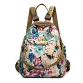 Mochila de oxford impermeable con vibrante estampado floral azul y rojo y hebilla frontal - Loto Grande