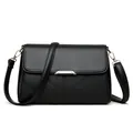 Chic black litchi leather crossbody bag with V-quilted flap and gold metal buckle - Black