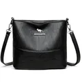 Minimalist black bucket bag with wide strap and silver kangaroo metal logo detail - Black