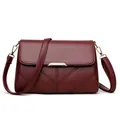 Women's burgundy pebble leather crossbody bag with flap and golden metal clasp - Burgundy