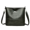 Dark green leather bucket bag featuring gold kangaroo logo and wide adjustable strap - Green