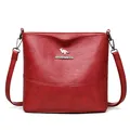 Fashionable red bucket bag variant with textured leather and wide shoulder strap - Red