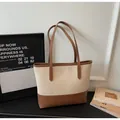 Minimalist beige canvas and brown leather patchwork tote bag with long double handles - Off White
