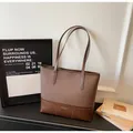 Brown casual tote bag with white contrast stitching and minimalist brand logo - Coffee