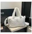 White quilted nylon pillow bag with double handles and a matching wide shoulder strap - White