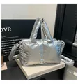 Metallic silver padded tote bag with puffy top handles and a shiny reflective finish - Silver