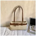 Minimalist beige canvas Boston bag with brown leather handles and silver metal buckles - Standard Type / Off White
